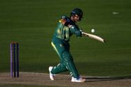 HOVE, ENGLAND - MAY 19: JP Duminy of South Africa hits out while Sussex wicket keeper Michael Burgess looks on during the Tour Match between Sussex and South Africa at The 1st Central County Ground on May 19, 2017 in Hove, England. (Photo by Charlie Crowhurst/Getty Images)